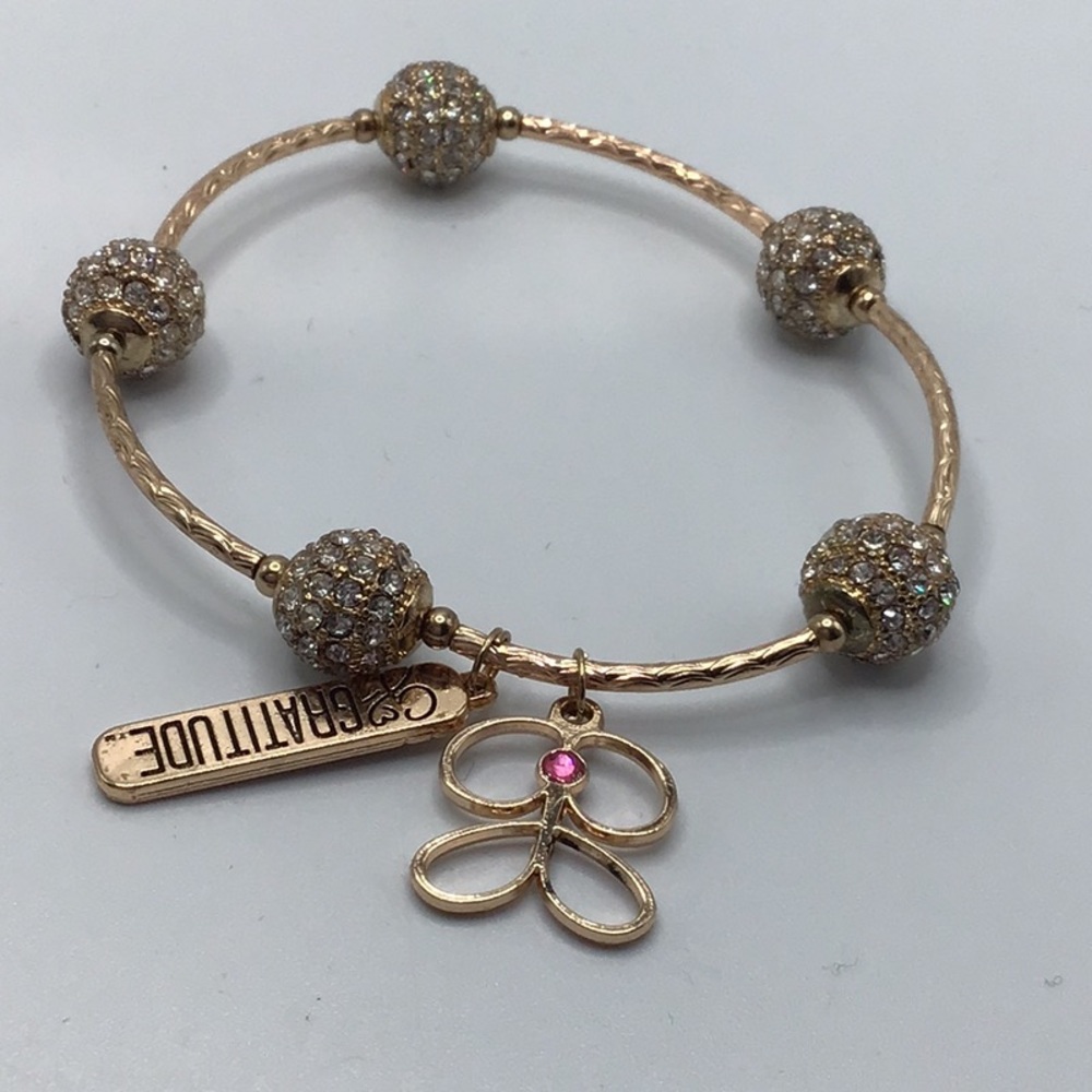 Gold Tone Stretch Gratitude Bracelet with Pink Accent